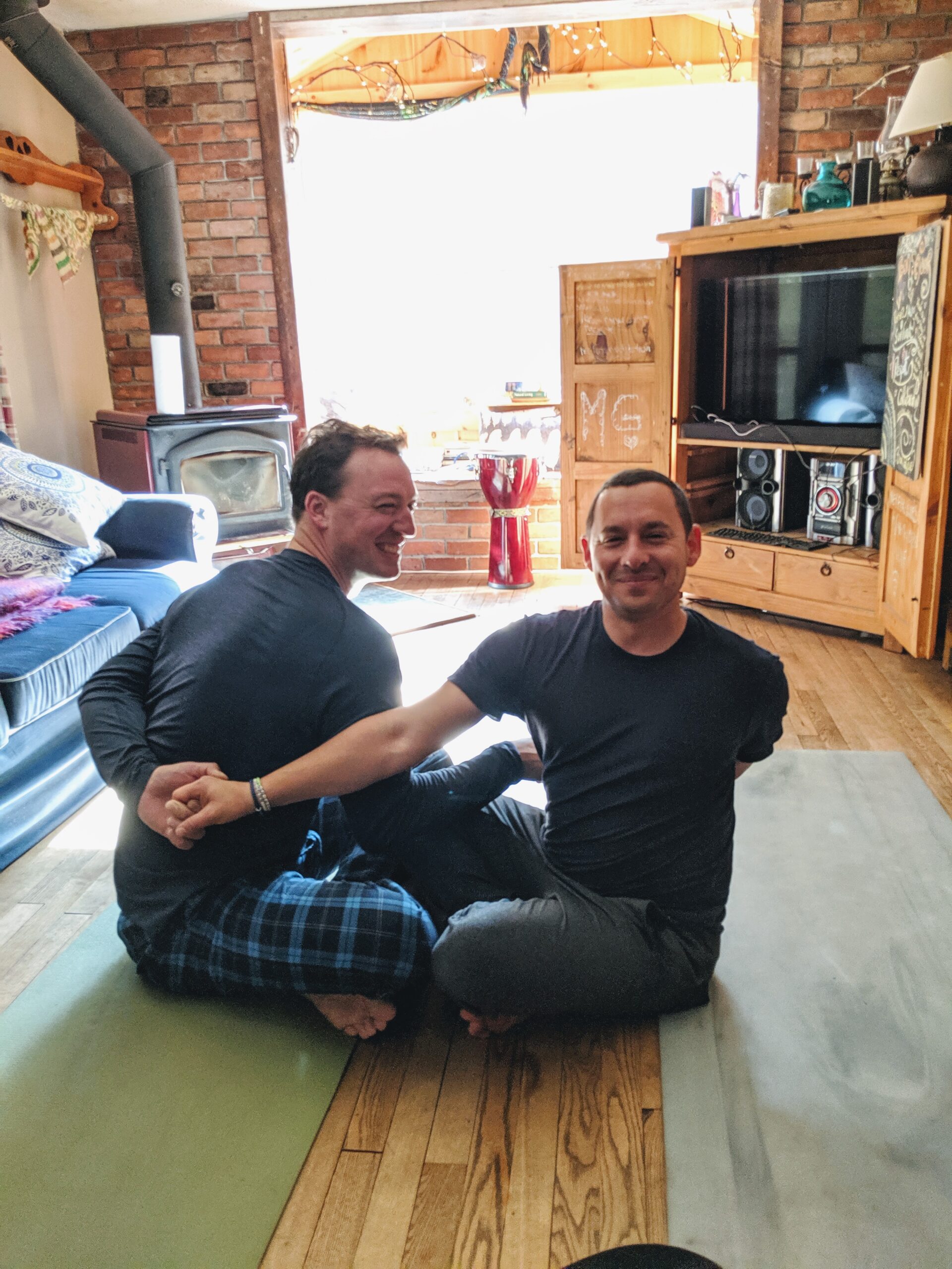 Harley and Steve practice yoga with Mike (2019)